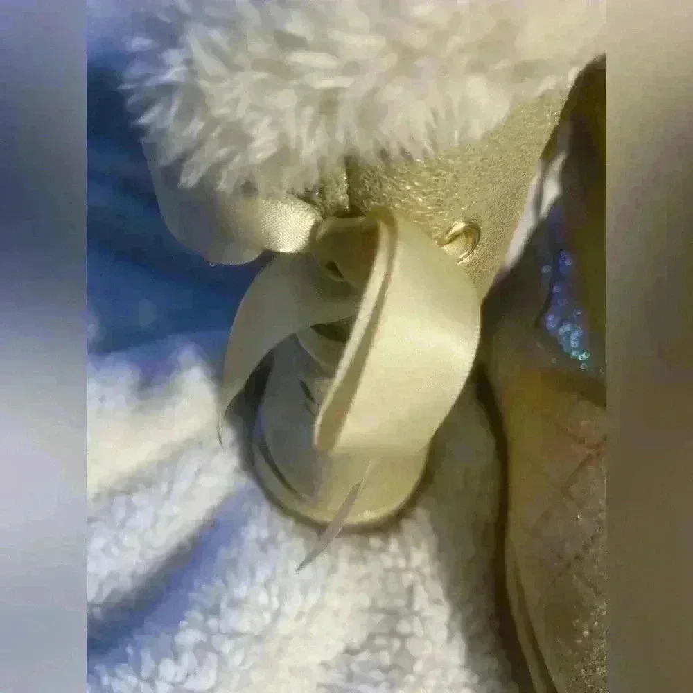 Cream iridescent, ribbon back tie, fleece lined boots size 2